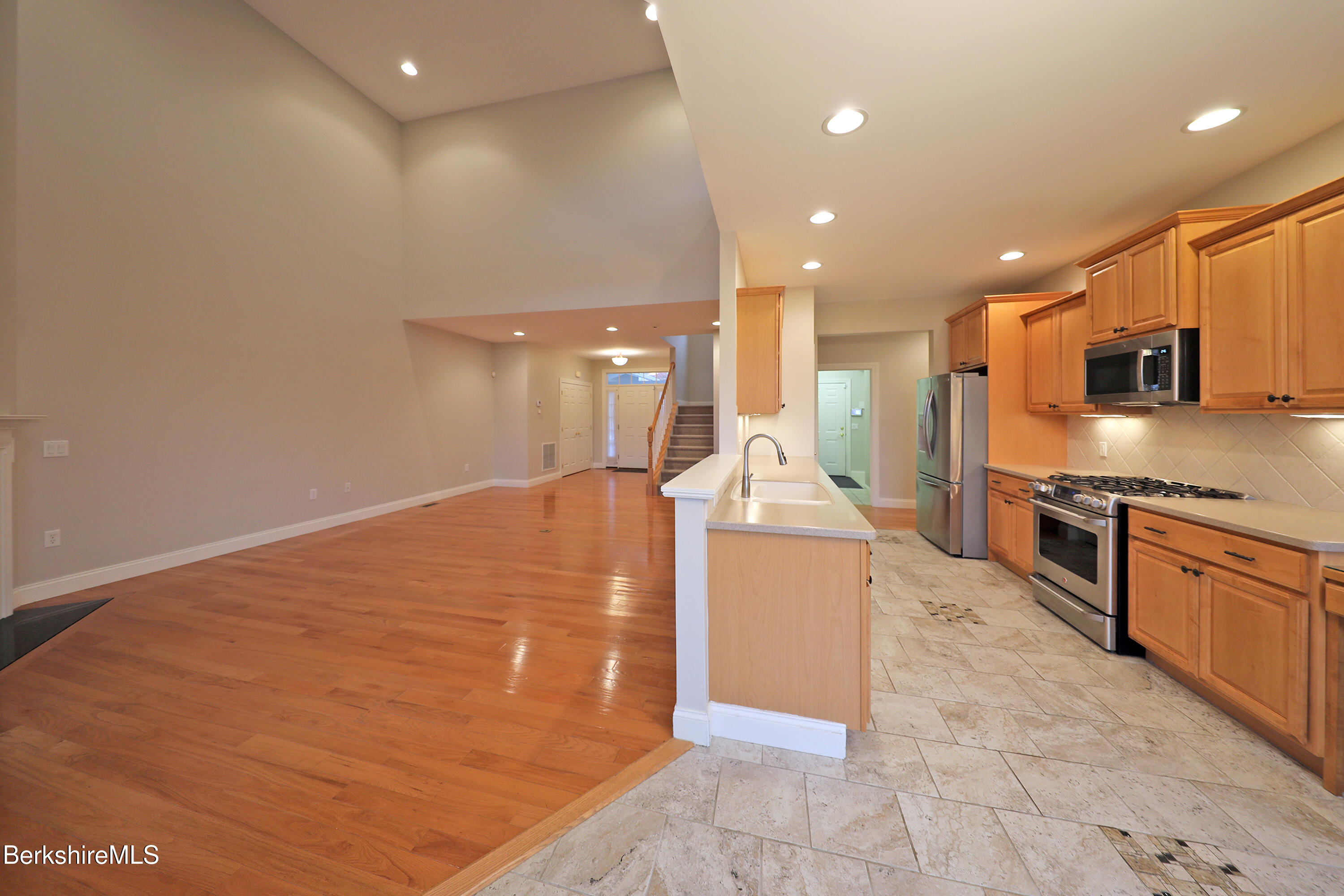 33 Alpine Trail Pittsfield, MA 01201 - Photo 11 of 69 a large kitchen with stainless steel appliances a large counter top and a stove