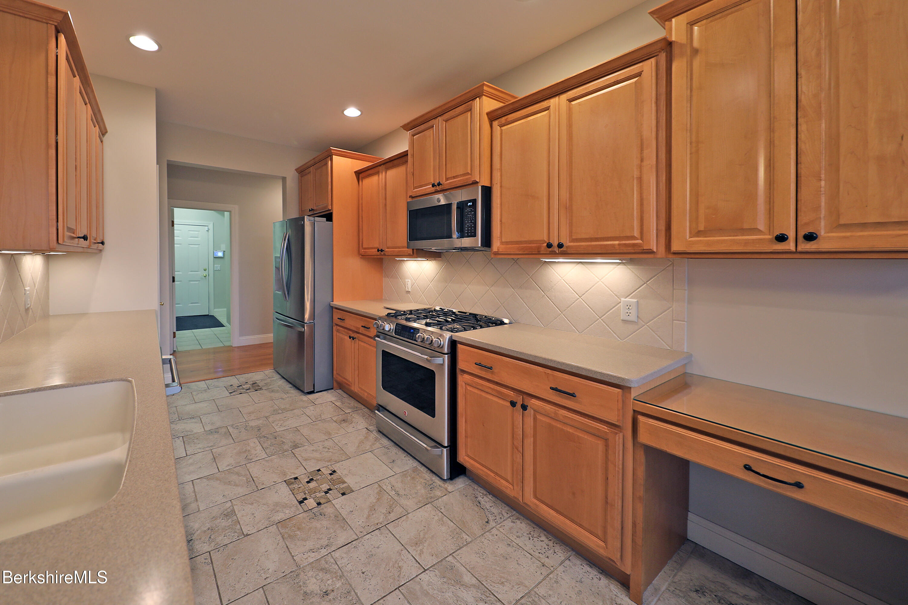 33 Alpine Trail Pittsfield, MA 01201 - Photo 13 of 69 a kitchen with stainless steel appliances granite countertop a refrigerator and a stove