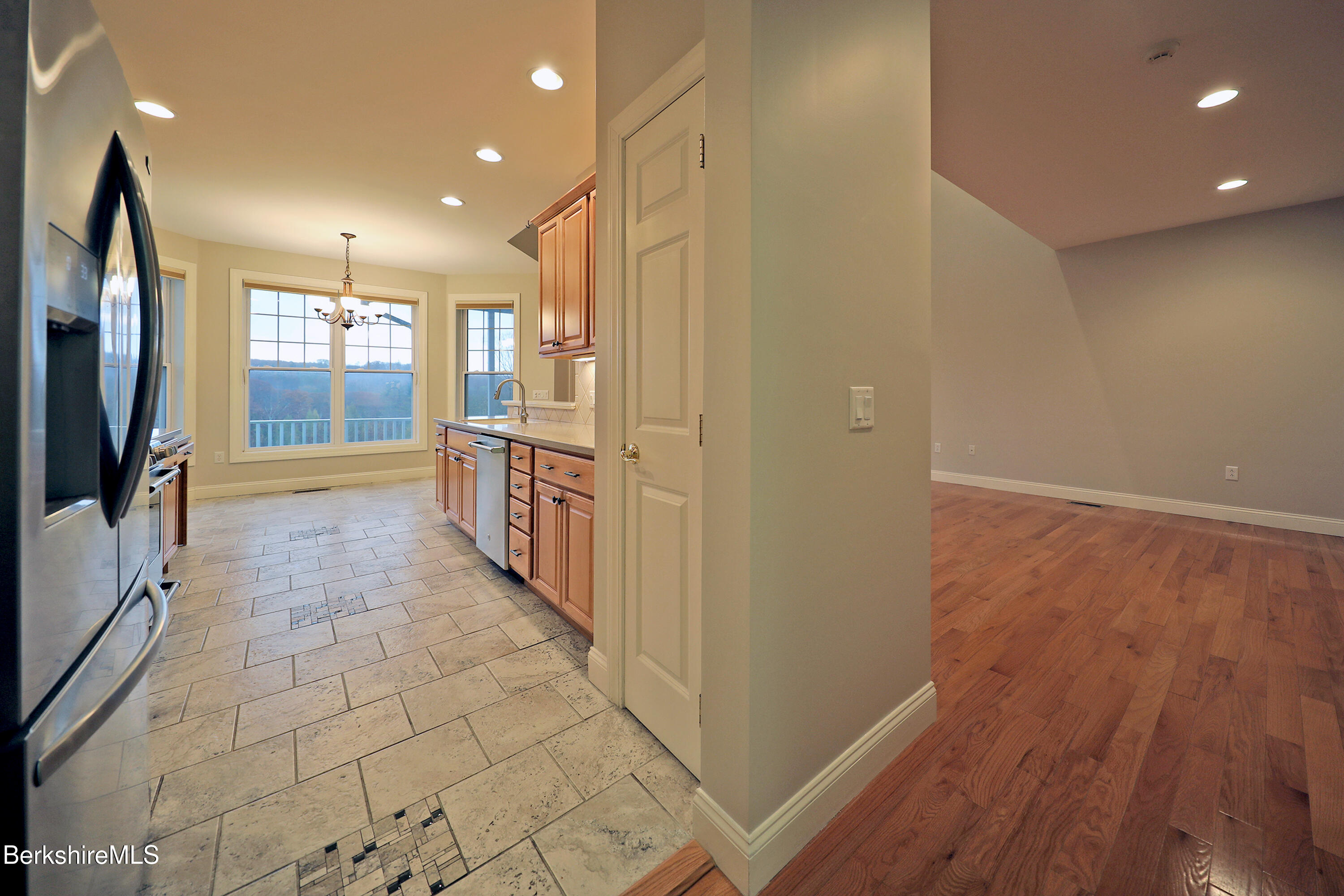 33 Alpine Trail Pittsfield, MA 01201 - Photo 15 of 69 a bathroom with a glass door shower a sink and a large mirror