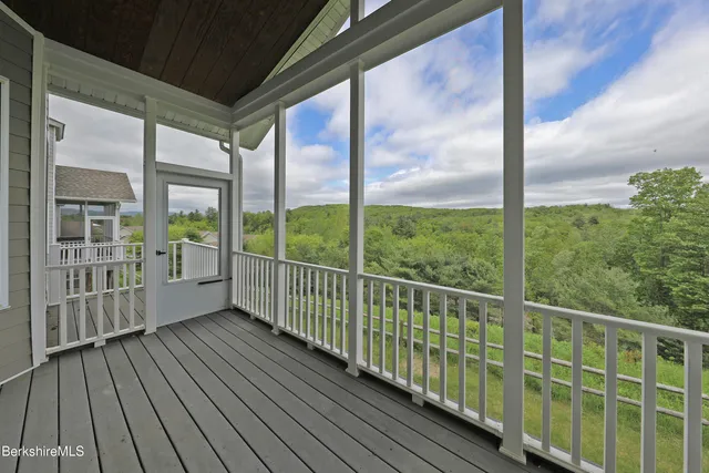 a bathroom with a shower and a toilet