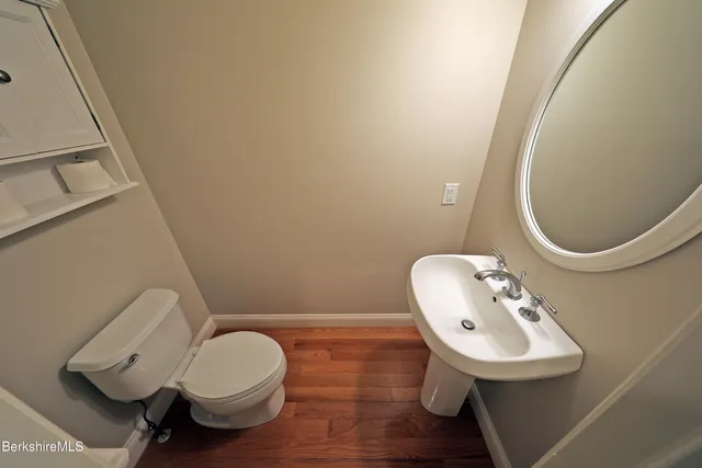 a view of a patio with swimming pool and table and chairs