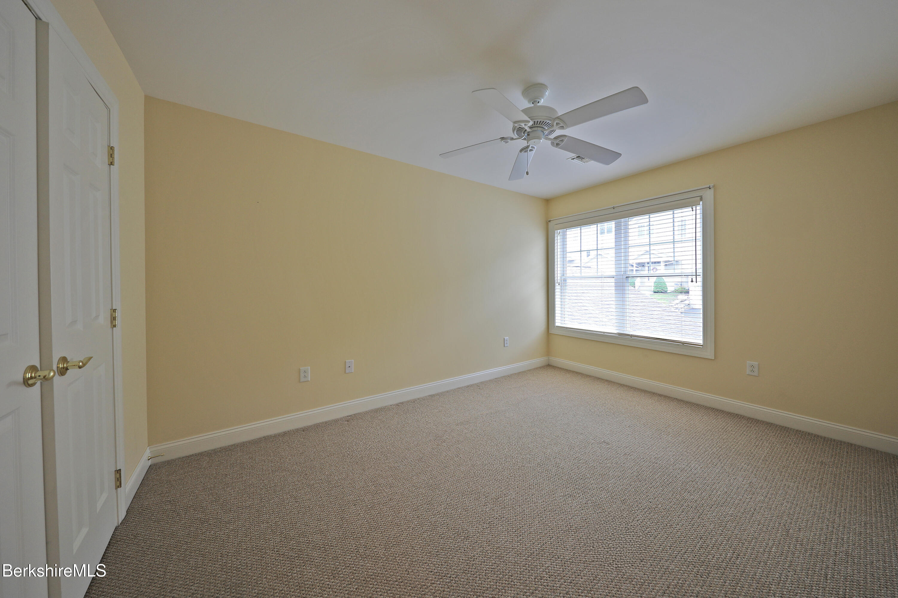 33 Alpine Trail Pittsfield, MA 01201 - Photo 46 of 69 an empty room with windows and fan