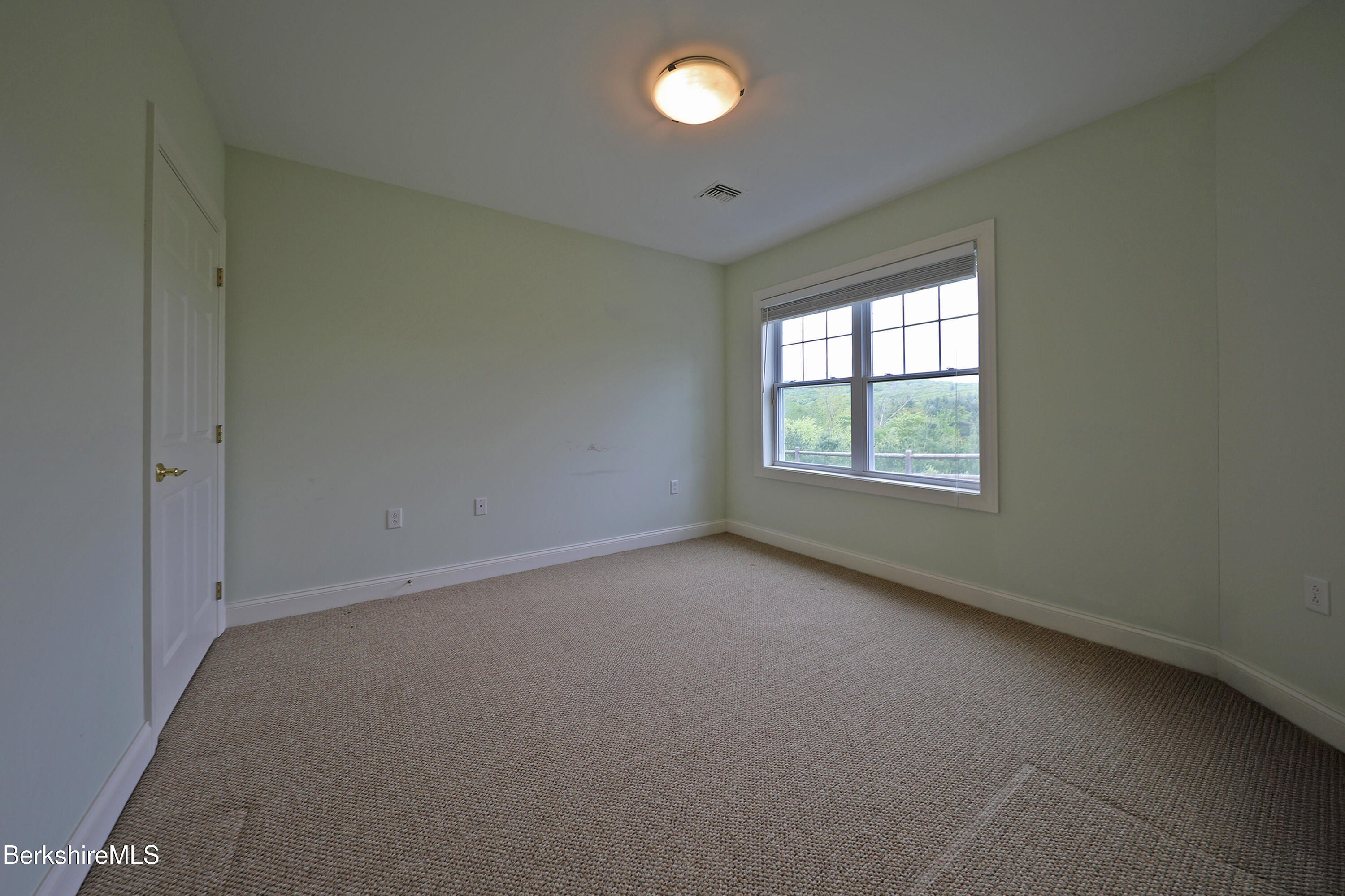33 Alpine Trail Pittsfield, MA 01201 - Photo 57 of 69 an empty room with a window