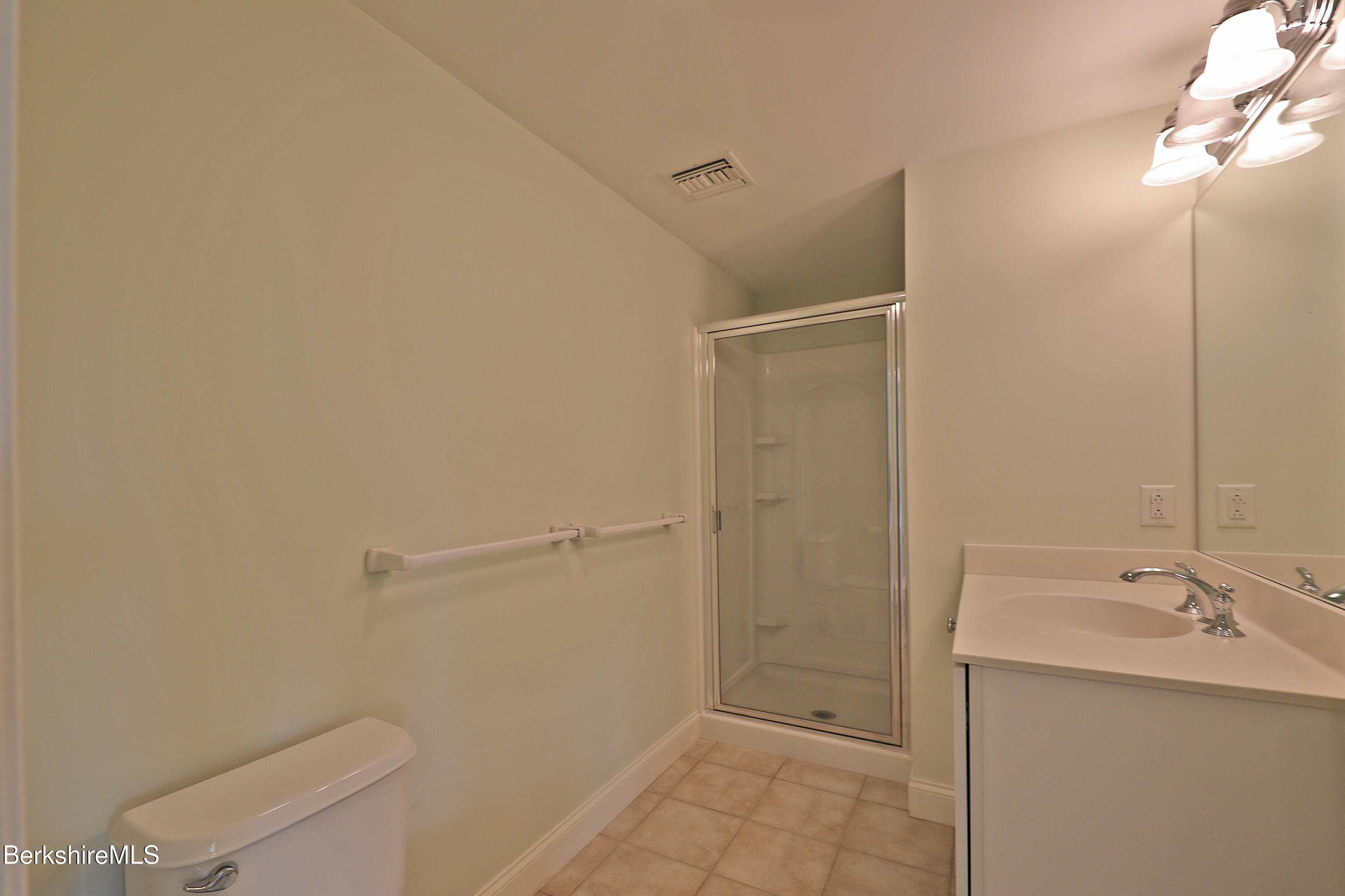 33 Alpine Trail Pittsfield, MA 01201 - Photo 59 of 69 a bathroom with a shower and a toilet