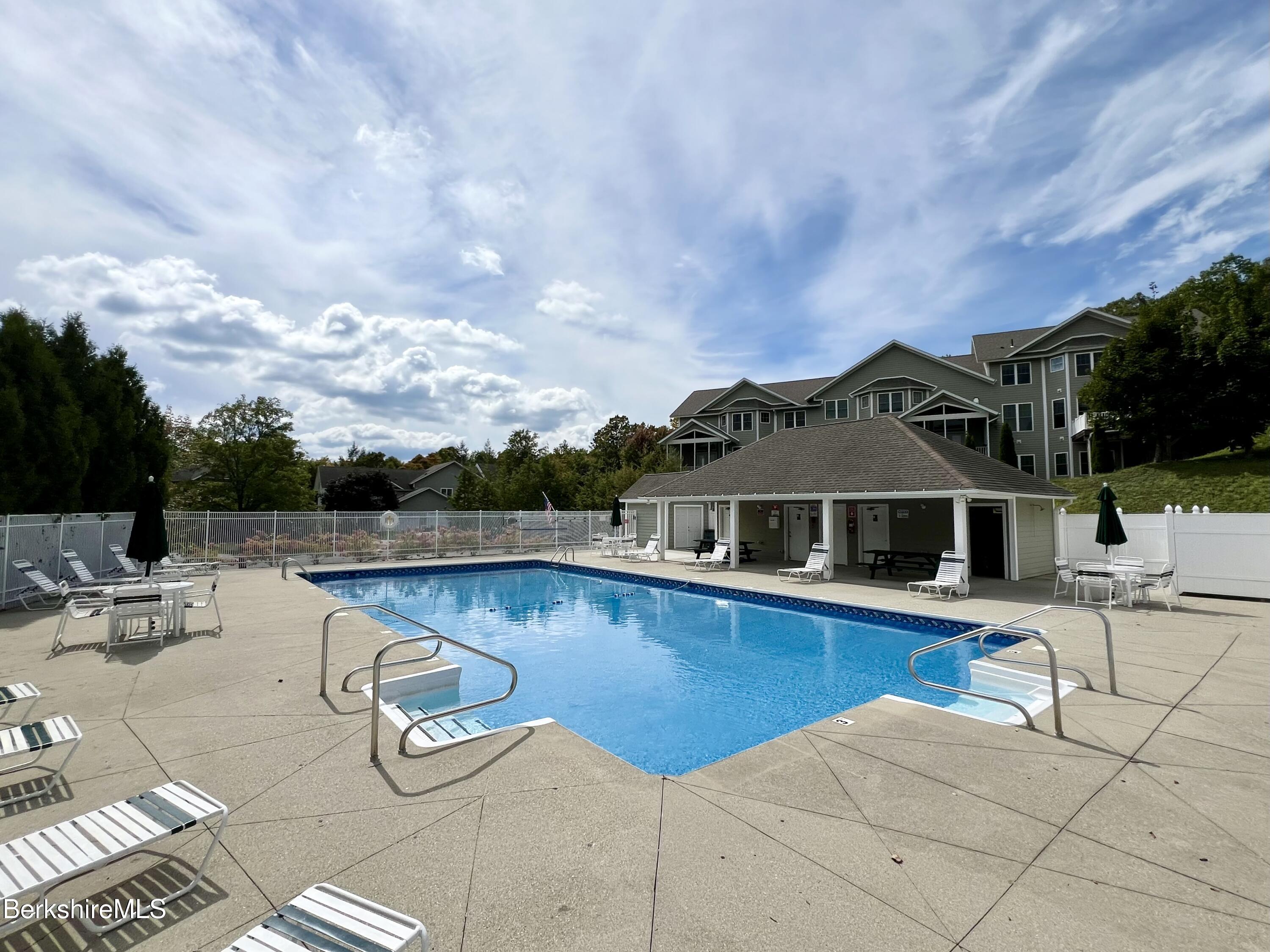 33 Alpine Trail Pittsfield, MA 01201 - Photo 68 of 69 a view of a house with pool and chairs