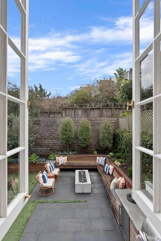 a view of entryway with hall and wooden floor