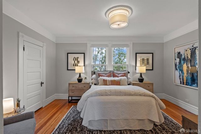 a bathroom with a sink vanity and mirror