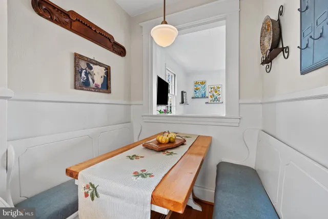 a workspace with furniture and flat screen tv