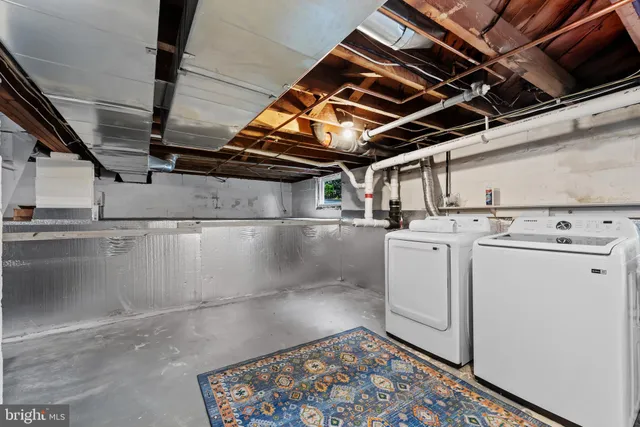 a utility room with cabinets