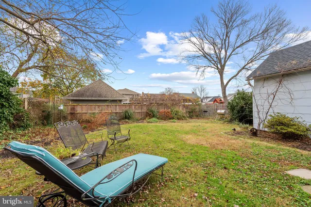 a view of a patio with a yard