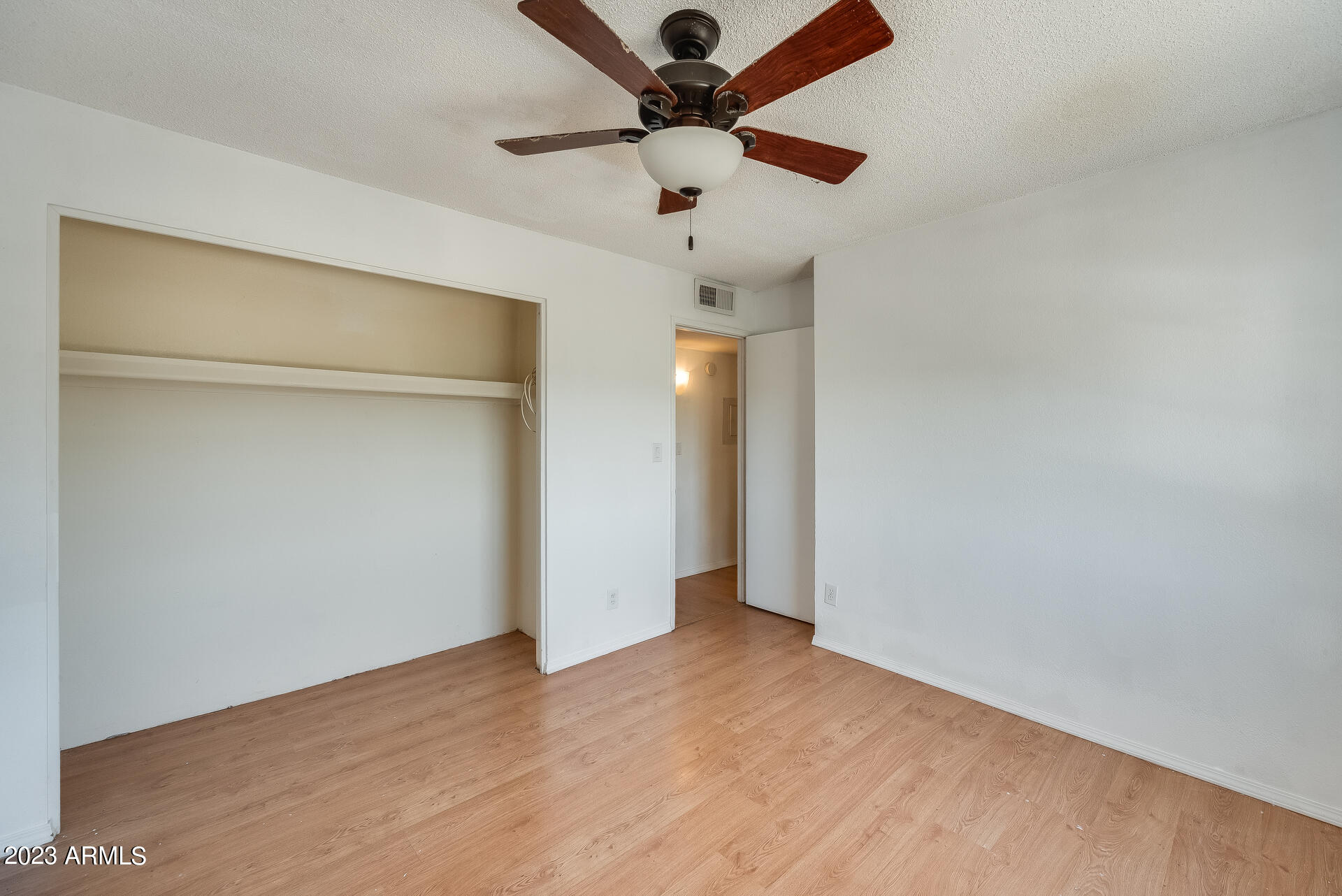 202 East Ruth Avenue, Unit 11 Phoenix, AZ 85020 - Photo 19 of 22 wooden floor in an empty room