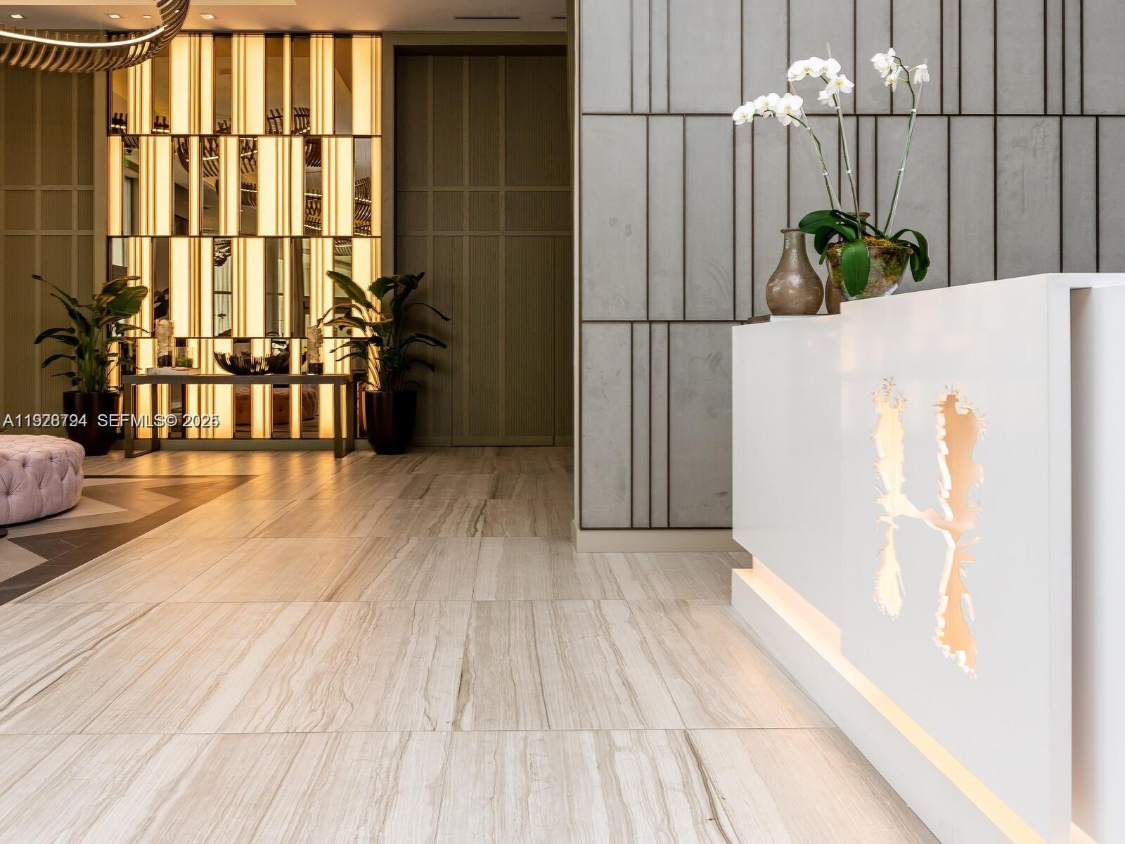 4010 South Ocean Drive, Unit R3105 Hollywood, FL 33019 - Photo 5 of 8 a view of hallway with wooden floor