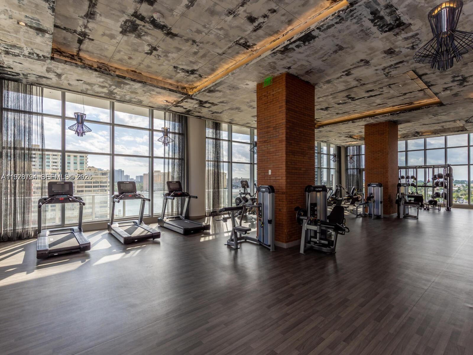 4010 South Ocean Drive, Unit R3105 Hollywood, FL 33019 - Photo 7 of 8 a view of a room with gym equipment