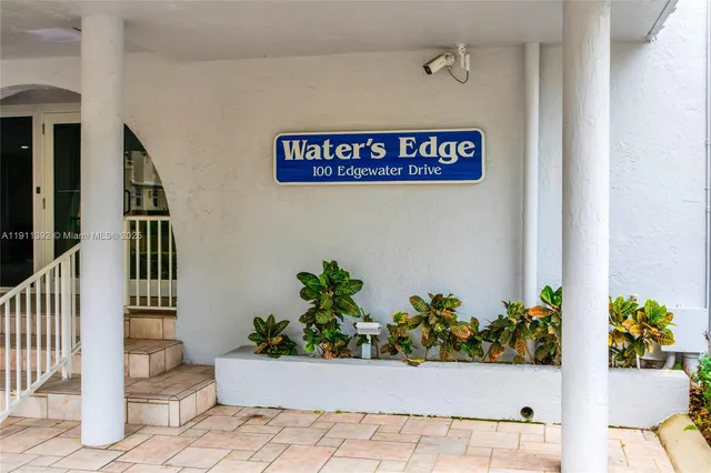 a view of sign board with an outdoor space