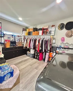 a view of a patio with table and chairs