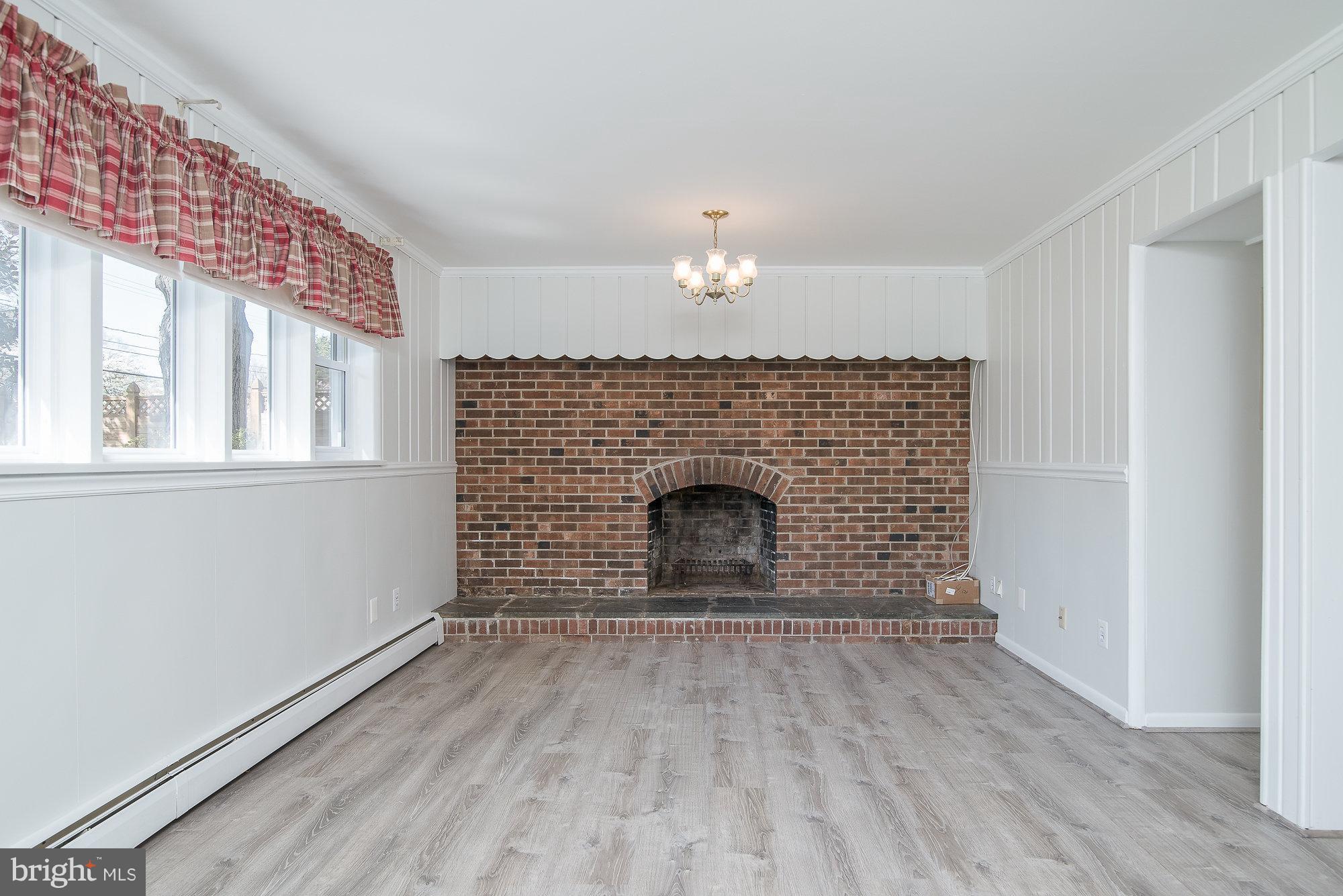 8821 Weems Road Manassas, VA 20110 - Photo 22 of 30 a view of empty room with a fireplace