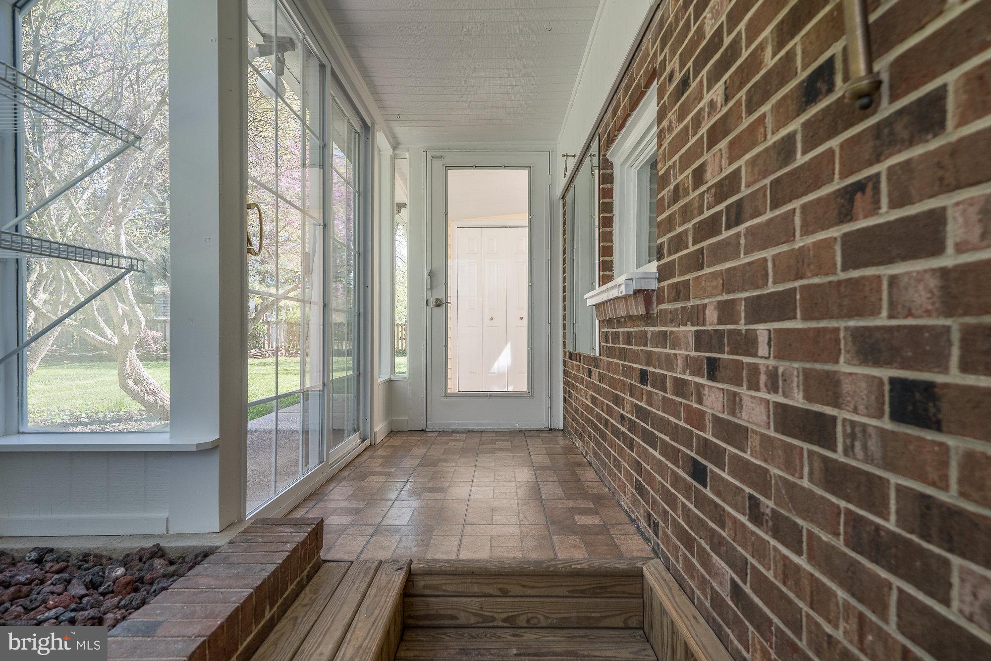 8821 Weems Road Manassas, VA 20110 - Photo 27 of 30 a view of a door and wooden floor