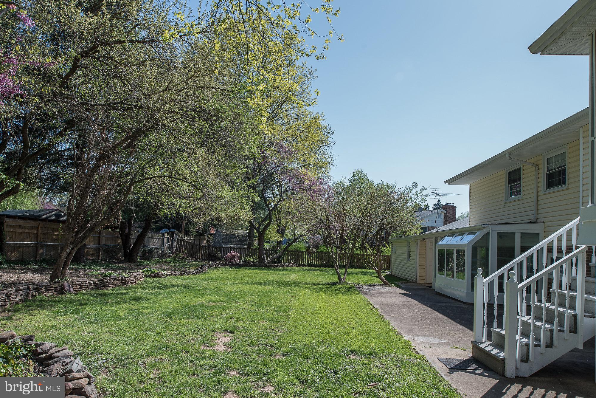 8821 Weems Road Manassas, VA 20110 - Photo 29 of 30 a view of house with a yard