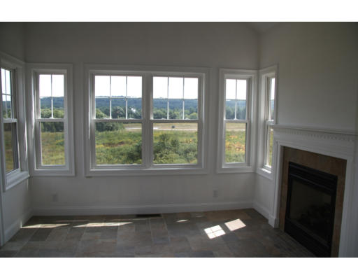 5 D Trail Ridge Way, Unit D Harvard, MA 01451 - Photo 1 of 6 a view of an empty room with a window