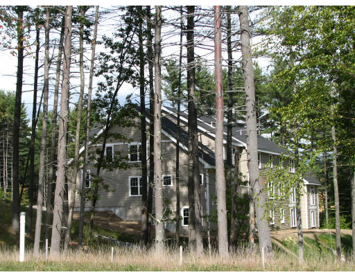 5 D Trail Ridge Way, Unit D Harvard, MA 01451 - Photo 2 of 6 a view of a yard in front of the house