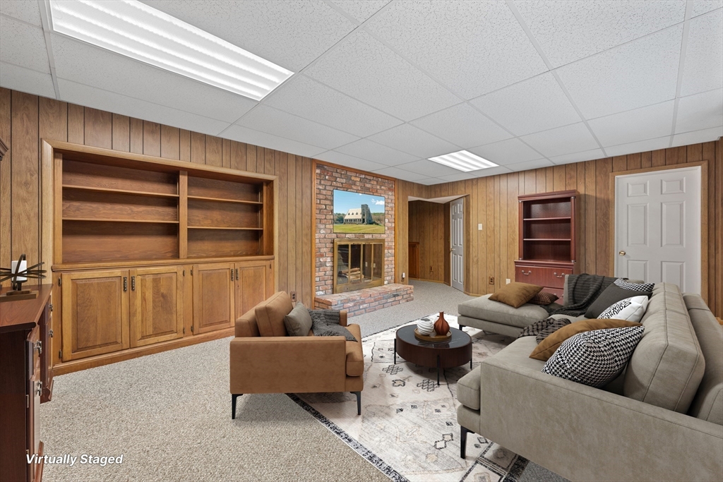 55 Warren Street Boylston, MA 01505 - Photo 16 of 30 a living room with furniture and a window