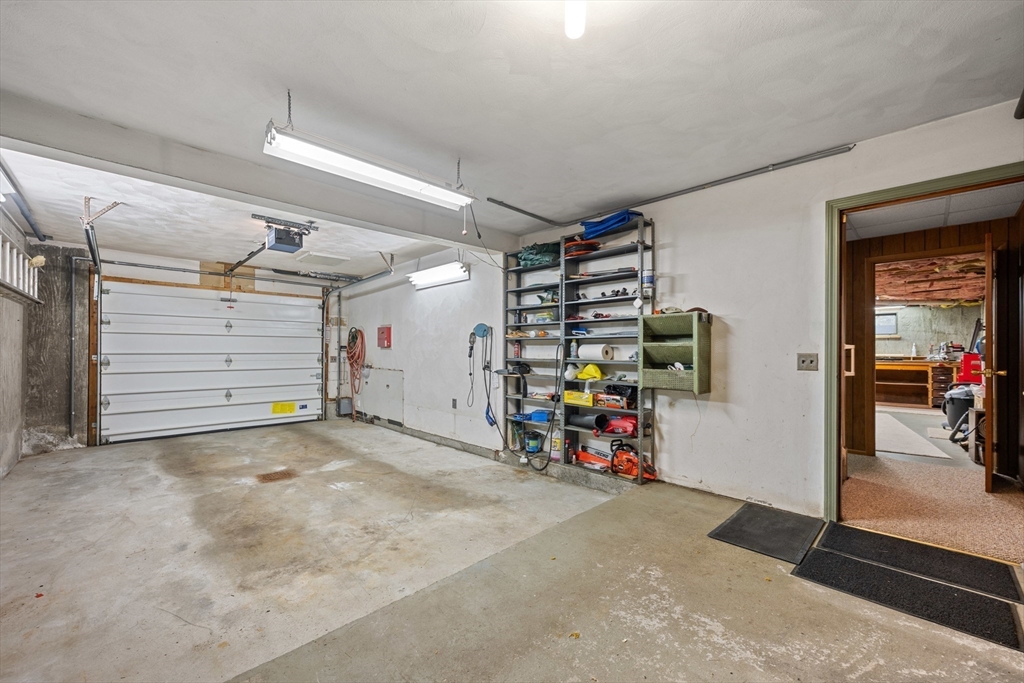 55 Warren Street Boylston, MA 01505 - Photo 20 of 30 a view of a garage with equipment
