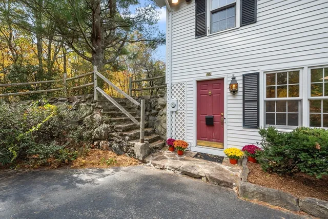 a backyard of a house with seating space