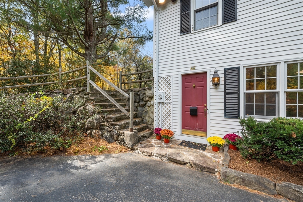55 Warren Street Boylston, MA 01505 - Photo 21 of 30 a backyard of a house with seating space