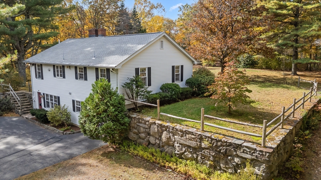 55 Warren Street Boylston, MA 01505 - Photo 22 of 30 a view of a house with backyard and garden