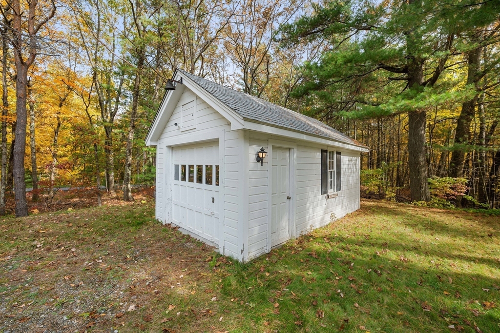 55 Warren Street Boylston, MA 01505 - Photo 23 of 30 a view of a house with a yard and large tree