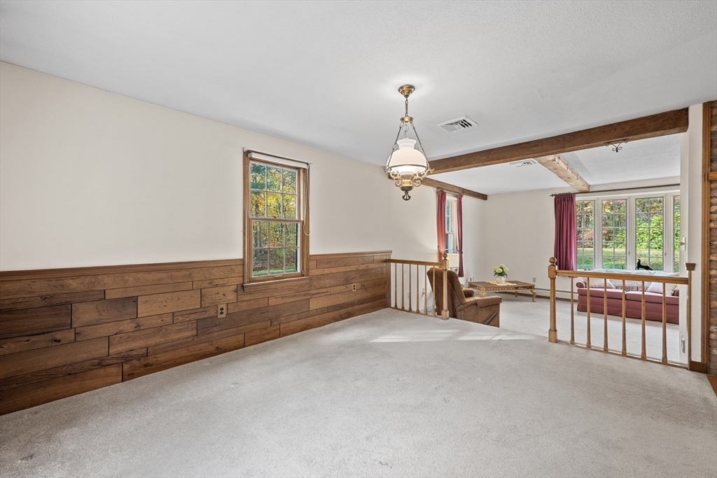 55 Warren Street Boylston, MA 01505 - Photo 4 of 30 a view of an empty room with a window