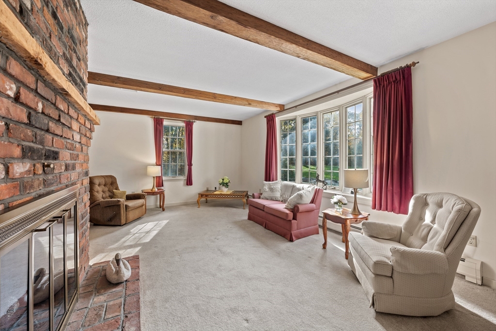 55 Warren Street Boylston, MA 01505 - Photo 7 of 30 a living room with furniture and a large window