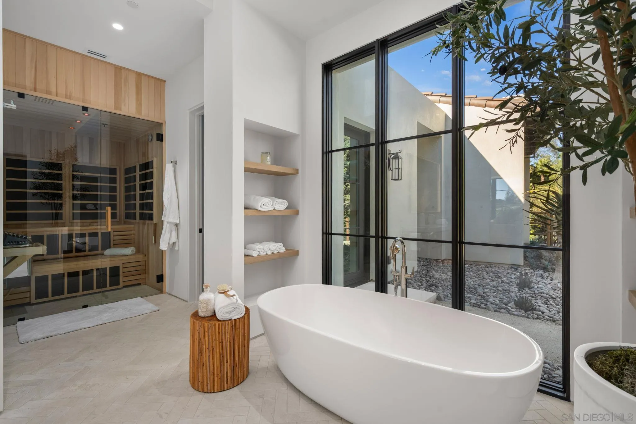 6323 Mimulus Rancho Santa Fe, CA 92067 - Photo 17 of 32 a bathroom with a bathtub and shower