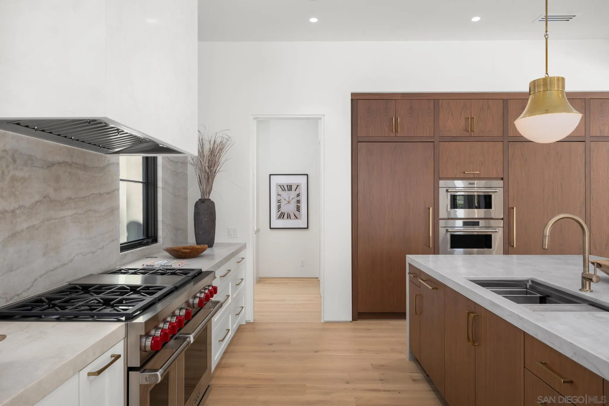 6323 Mimulus Rancho Santa Fe, CA 92067 - Photo 6 of 32 a kitchen with stainless steel appliances granite countertop a stove a sink and a refrigerator