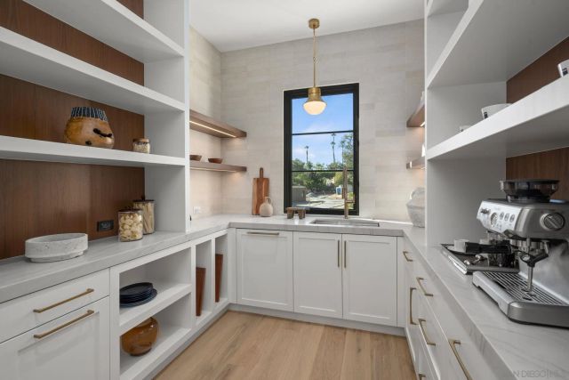 a view of a patio with a yard