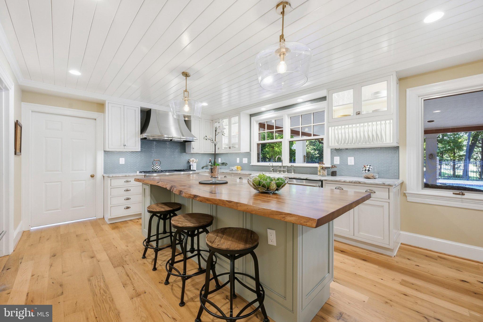 10804 Lockland Road Potomac, MD 20854 - Photo 14 of 47 Chef's Gourmet Kitchen with Live Edge Wood Island