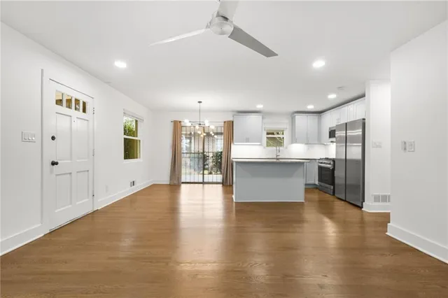 a view of kitchen with wooden floor