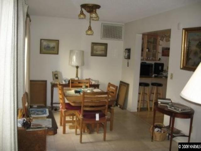1141 Rayburn Drive Reno, NV 89503 - Photo 4 of 9 a view of a dining room with furniture
