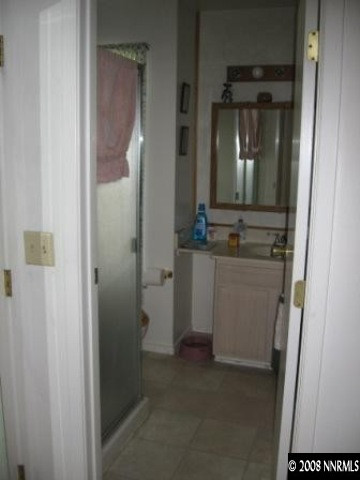 1141 Rayburn Drive Reno, NV 89503 - Photo 5 of 9 a view of a bathroom from a hallway