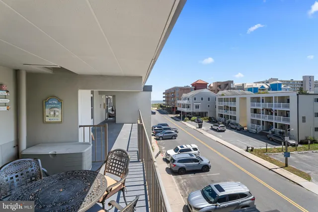 a room with lots of chairs and mirrors