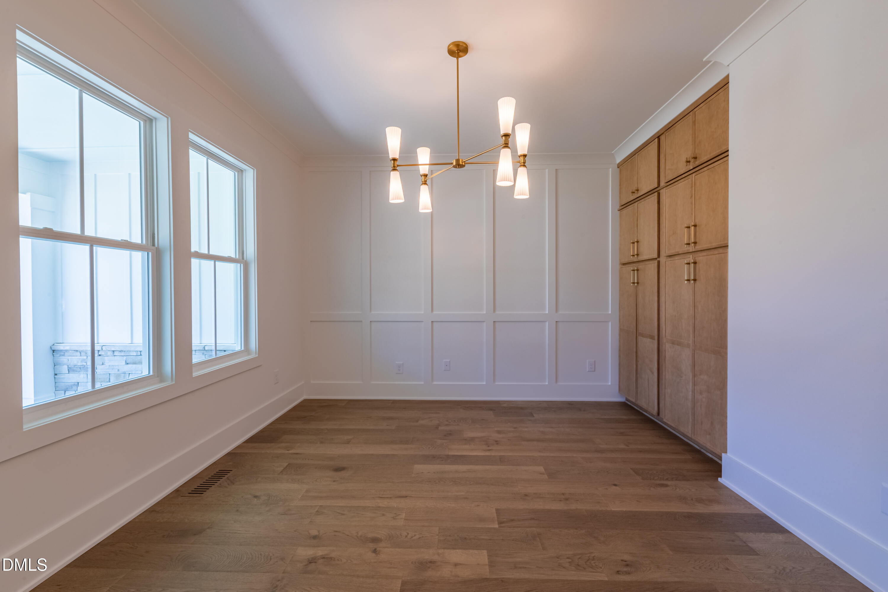 5709 Flowery Mdw Court Wake Forest, NC 27587 - Photo 12 of 69 wooden floor in an empty room with a window
