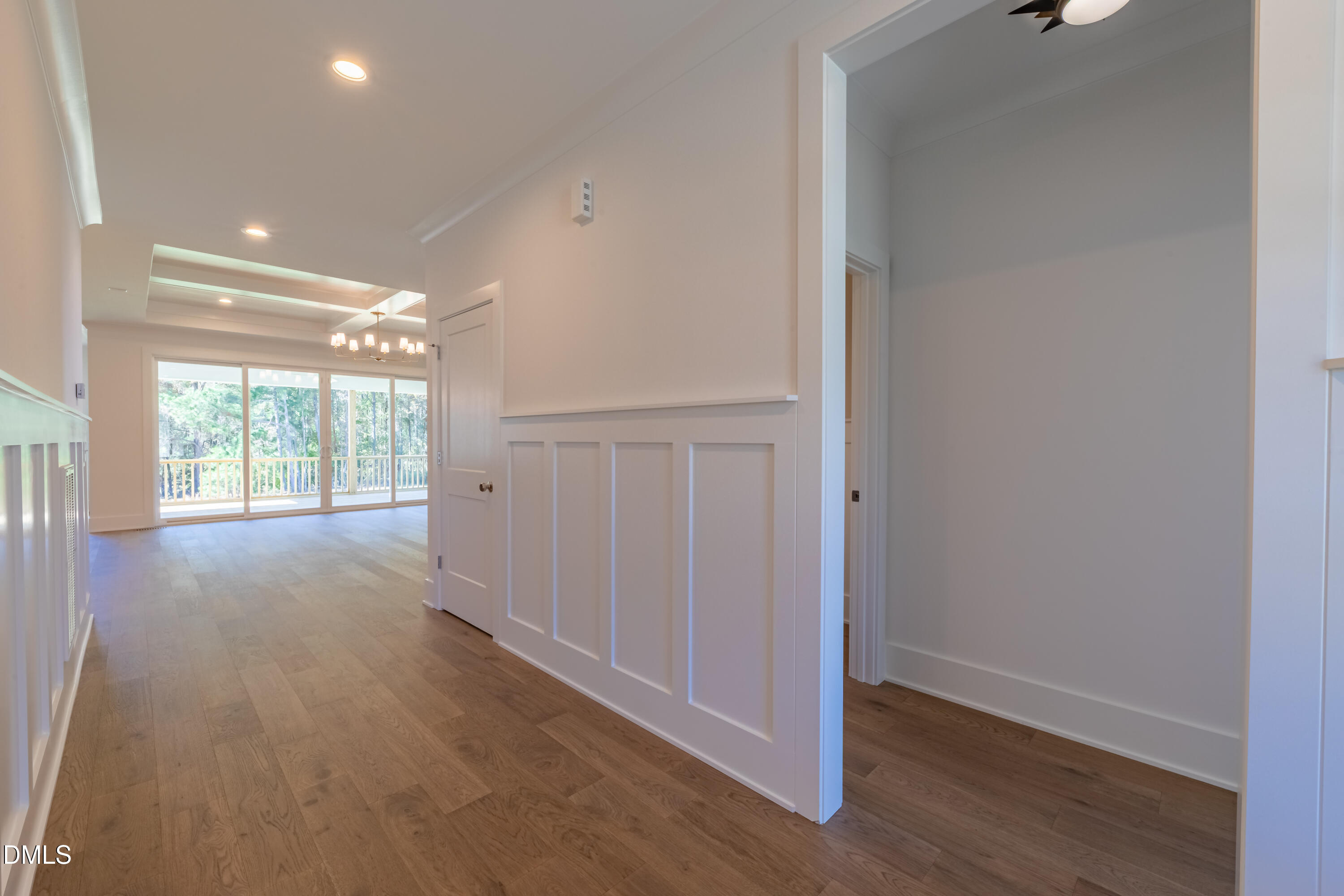 5709 Flowery Mdw Court Wake Forest, NC 27587 - Photo 15 of 69 an empty room with wooden floor and windows