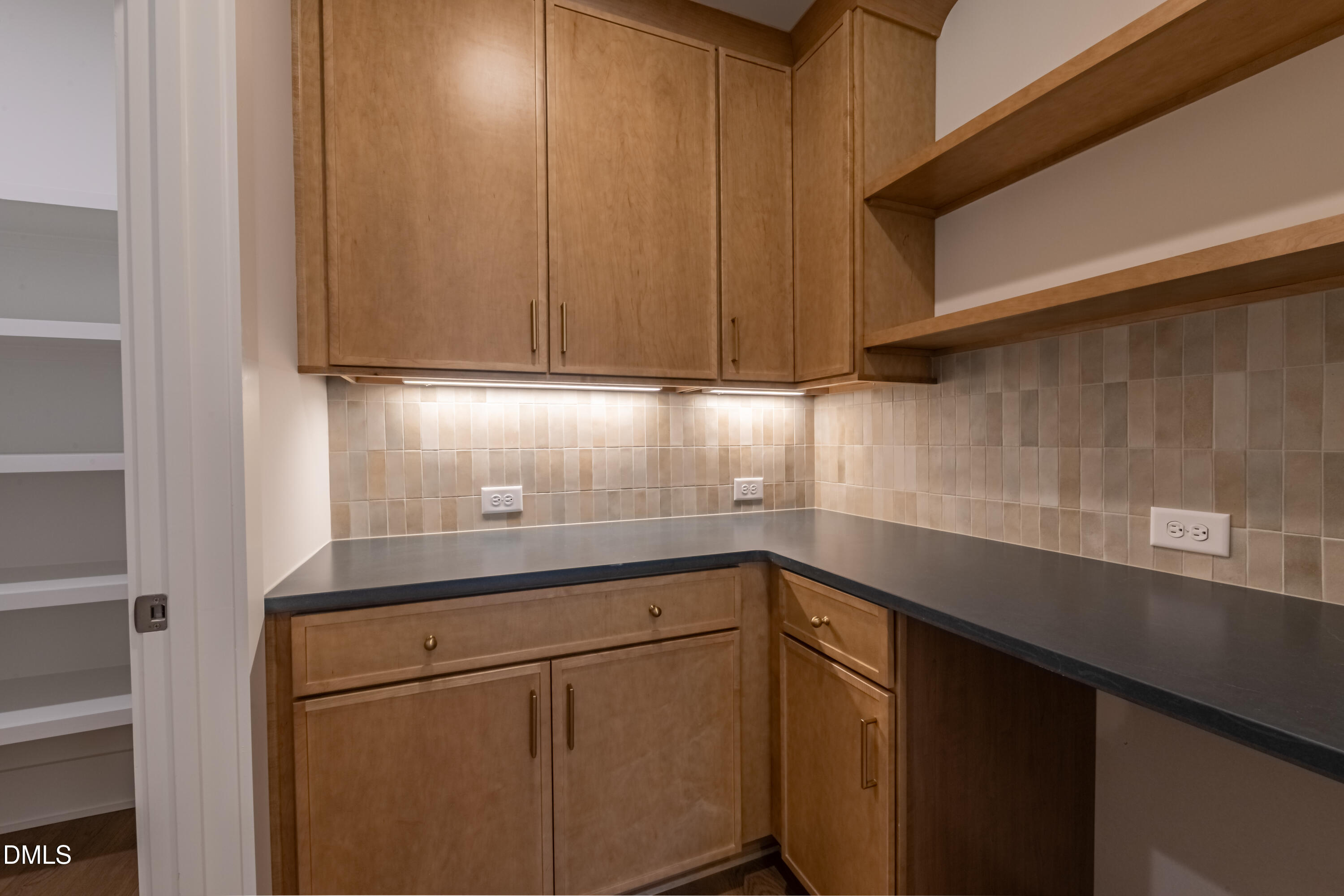 5709 Flowery Mdw Court Wake Forest, NC 27587 - Photo 27 of 69 a kitchen with a sink and cabinets