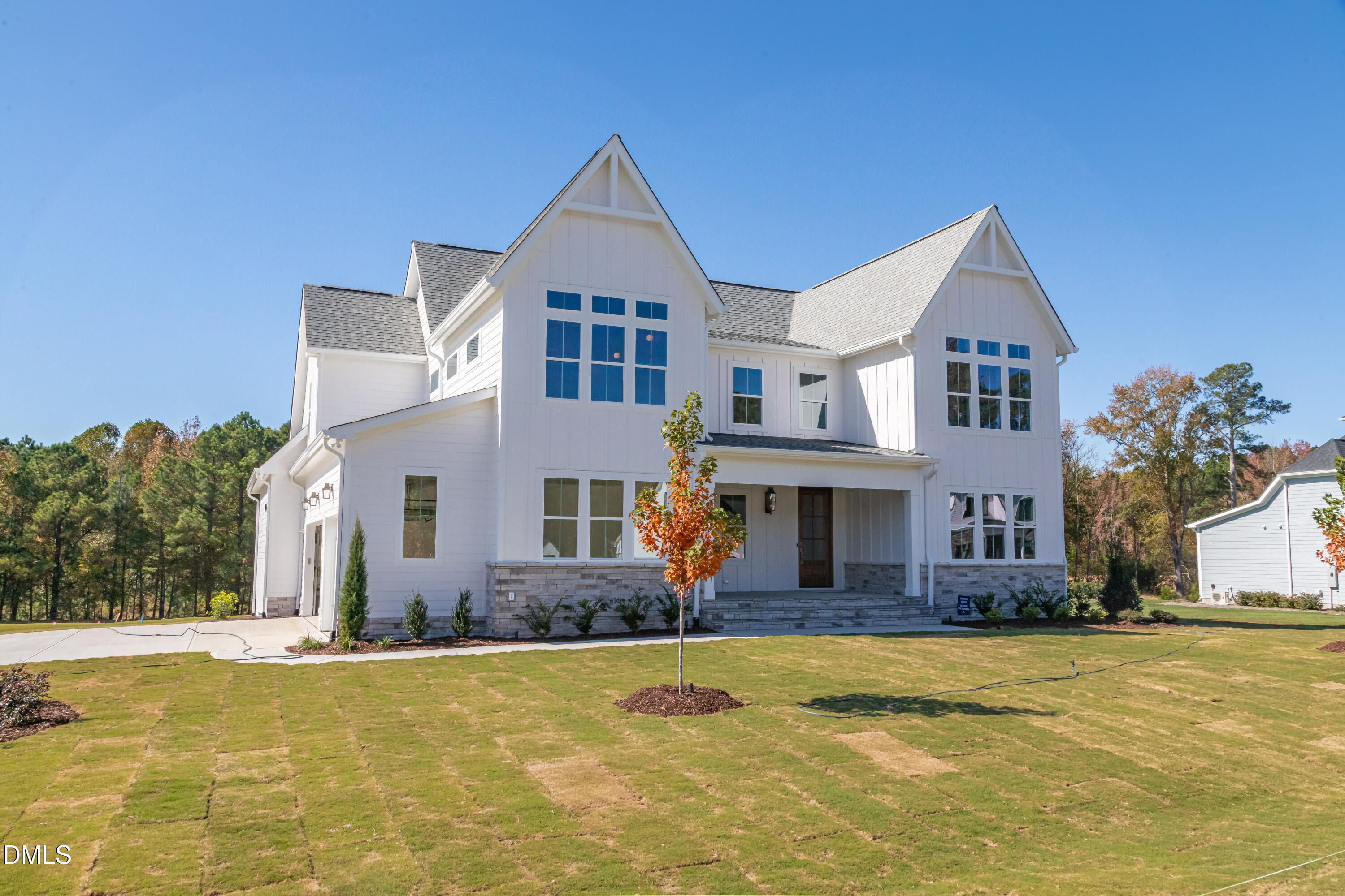 5709 Flowery Mdw Court Wake Forest, NC 27587 - Photo 3 of 69 a front view of a house with a yard