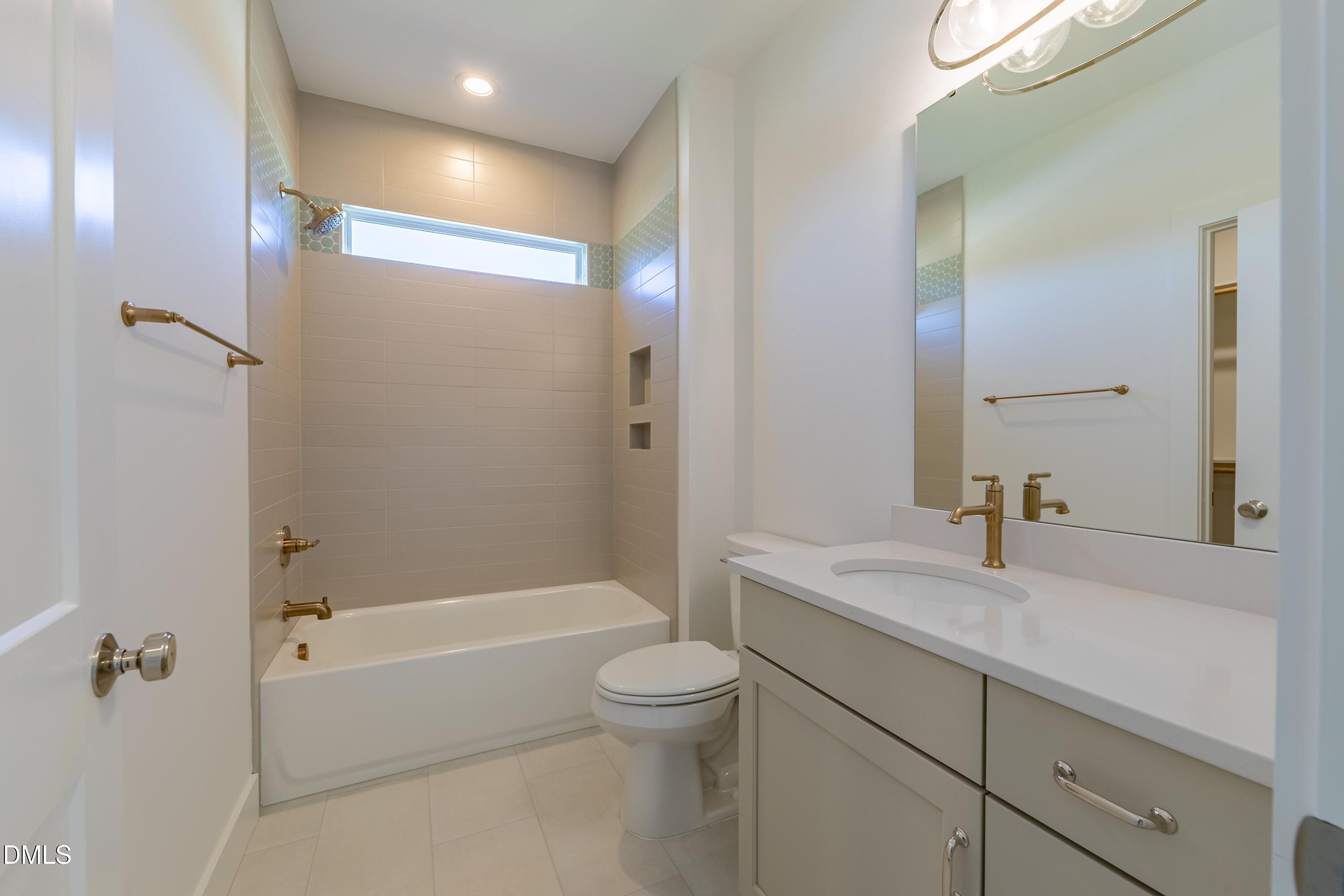 5709 Flowery Mdw Court Wake Forest, NC 27587 - Photo 55 of 69 a bathroom with a granite countertop sink a toilet and shower