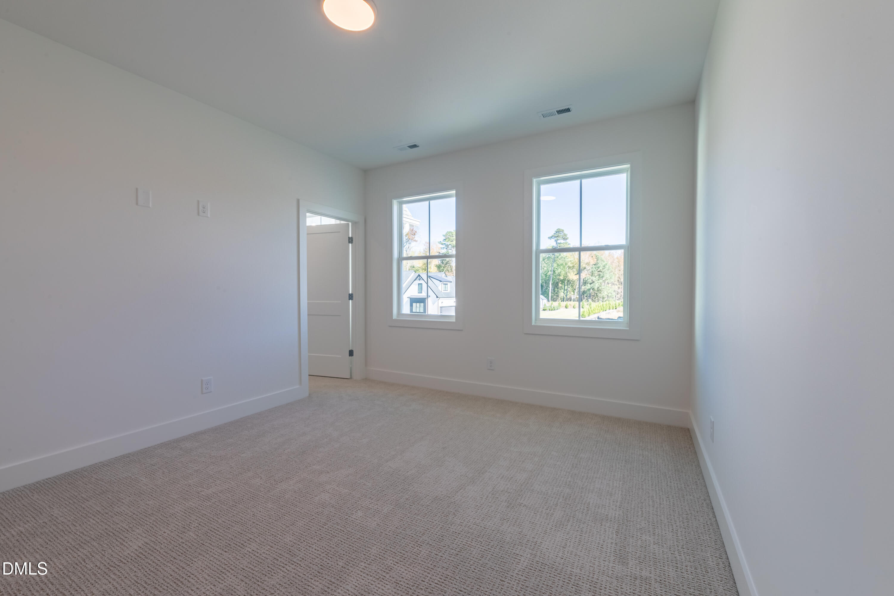 5709 Flowery Mdw Court Wake Forest, NC 27587 - Photo 56 of 69 an empty room with windows