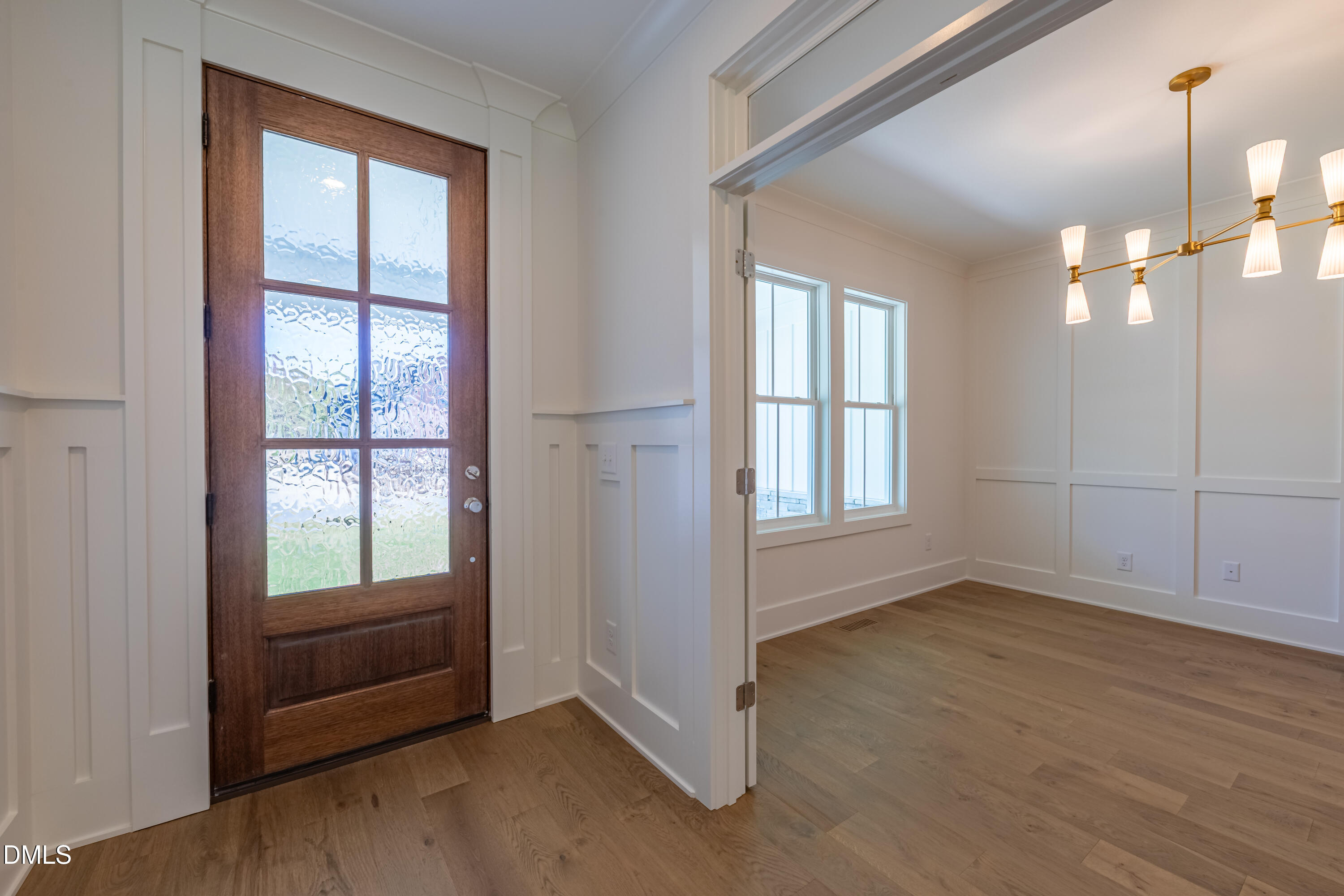 5709 Flowery Mdw Court Wake Forest, NC 27587 - Photo 9 of 69 an empty room with windows and cabinet