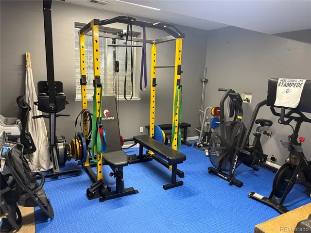 a view of a room with gym equipment