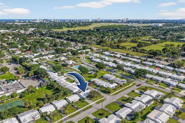 an aerial view of residential building with outdoor space