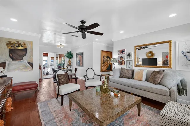 a living room with furniture and a rug